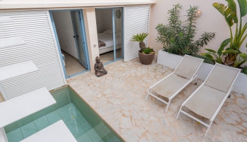 Resa Estates Ibiza sale ted koop Cala Tarida patio townhouse air photo 2.JPG